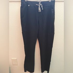 FIGS SCRUBS used. grey and black. Scrub top and bottoms $25 top. $30 bottom